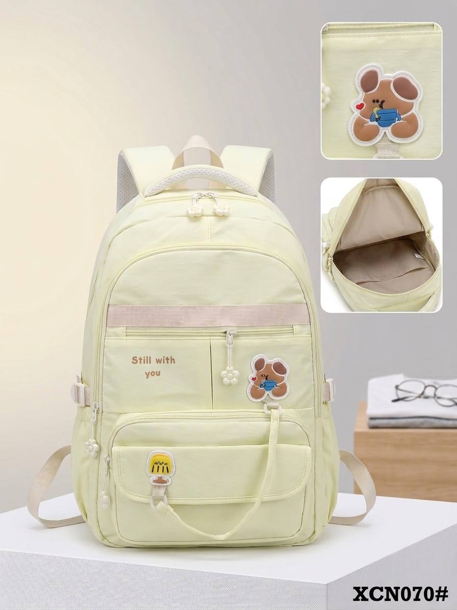 Cute Cream School Backpack with Dog Charm — Bags — for sale in Oyo